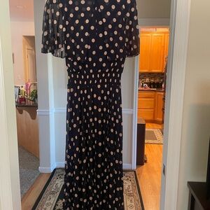 Elegant Black and Cream Polka Dot Midi Dress